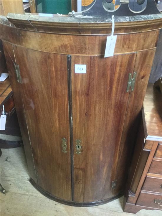 George III mahogany bow-fronted hanging corner cupboard